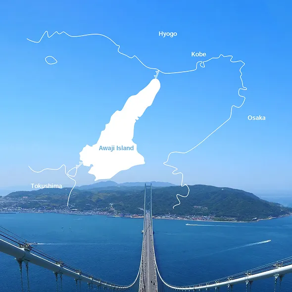 An overhead map graphic overlaid on an aerial view of the Akashi Kaikyo Bridge, illustrating the geographic location of Awaji Island in relation to Hyogo, Kobe, Osaka, and Tokushima.