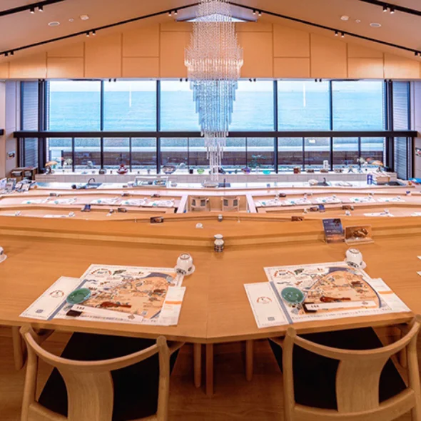 Modern ocean-view restaurant on Awaji Island serving sushi and tempura with ocean views, showcasing elegant interior design and famous Awaji Island food culture.
