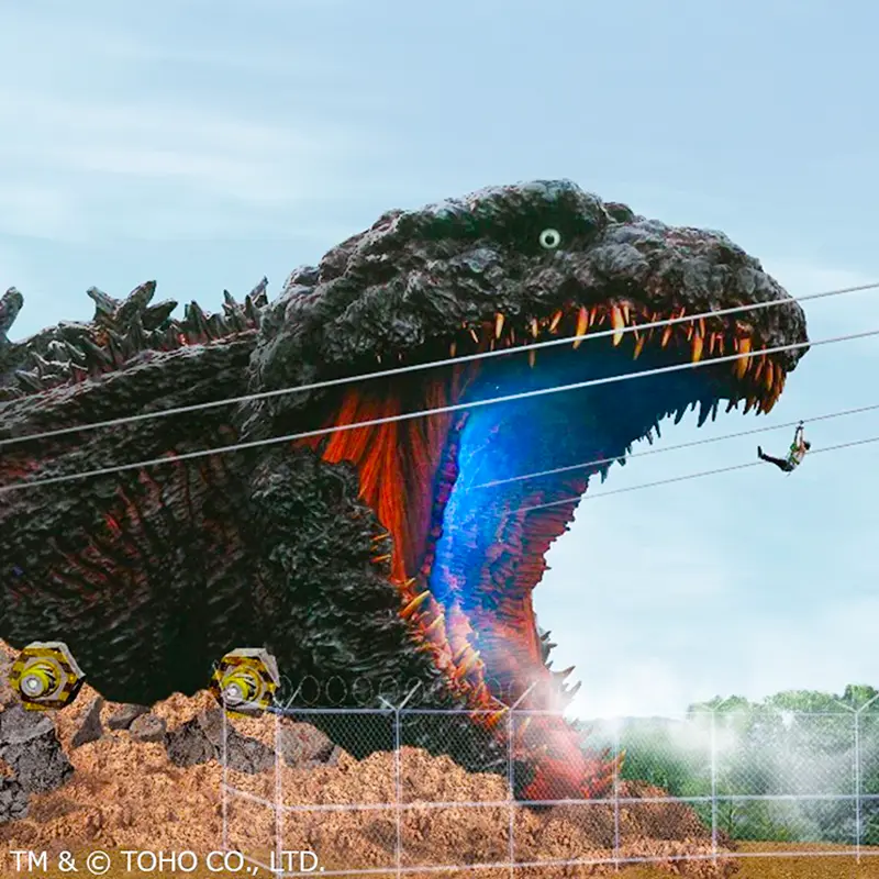 Zipline experience flying toward life-sized Godzilla at Nijigen no Mori on Awaji Island