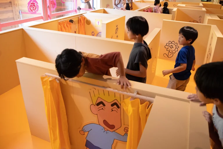 Kids solving puzzles inside Futaba Yochien at Crayon Shinchan Adventure Park Nijigen no Mori Awaji Island