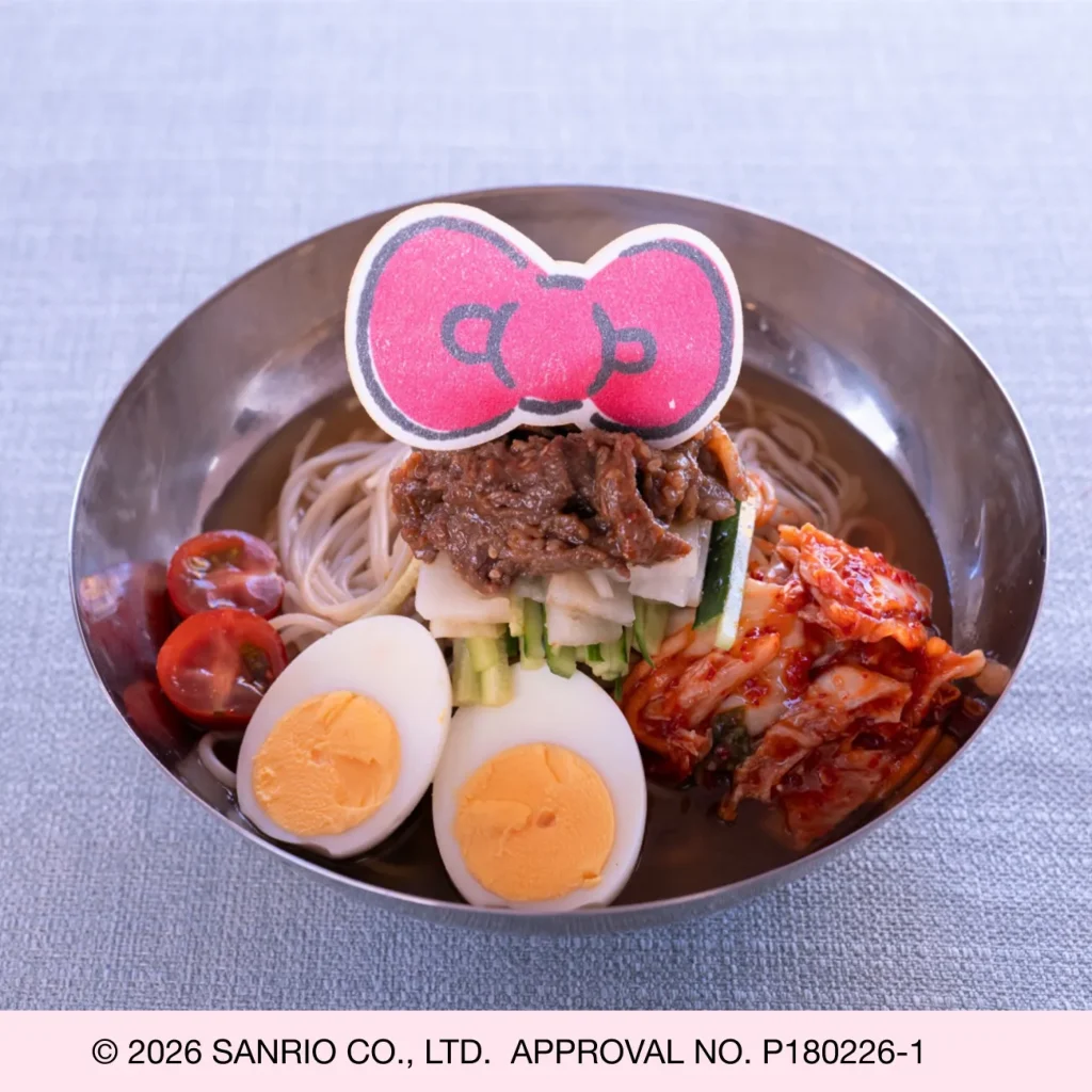 noodle dish with egg, vegetables, and Hello Kitty bow decoration at GARDEN Terrace Awaji Island