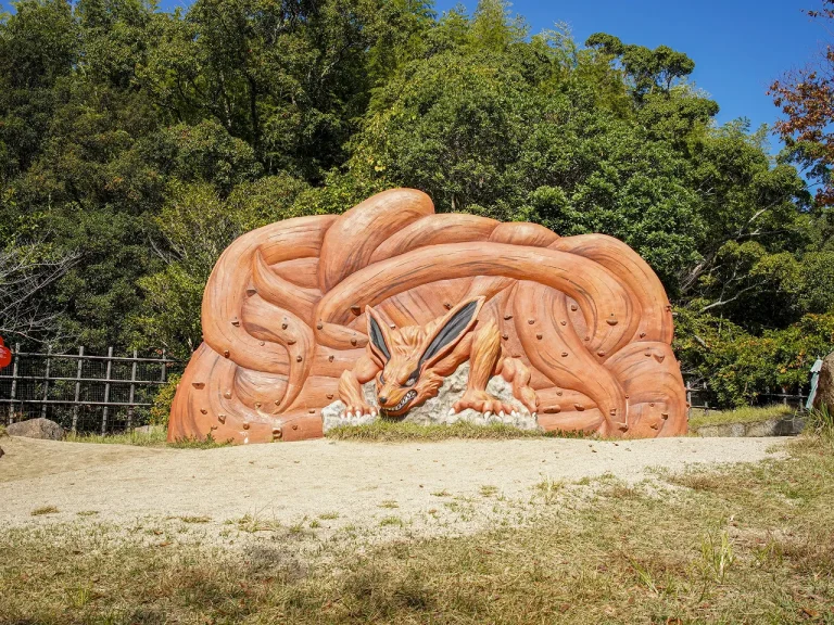 Statue of Kurama nine tailed demon fox at Naruto Shinobi-Zato in Nijigen no Mori on Awaji Island